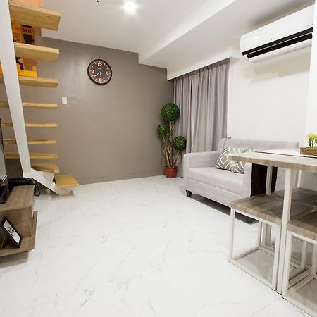 טאגיג Oasis Regency @ Fort Victoria Bgc מראה חיצוני תמונה