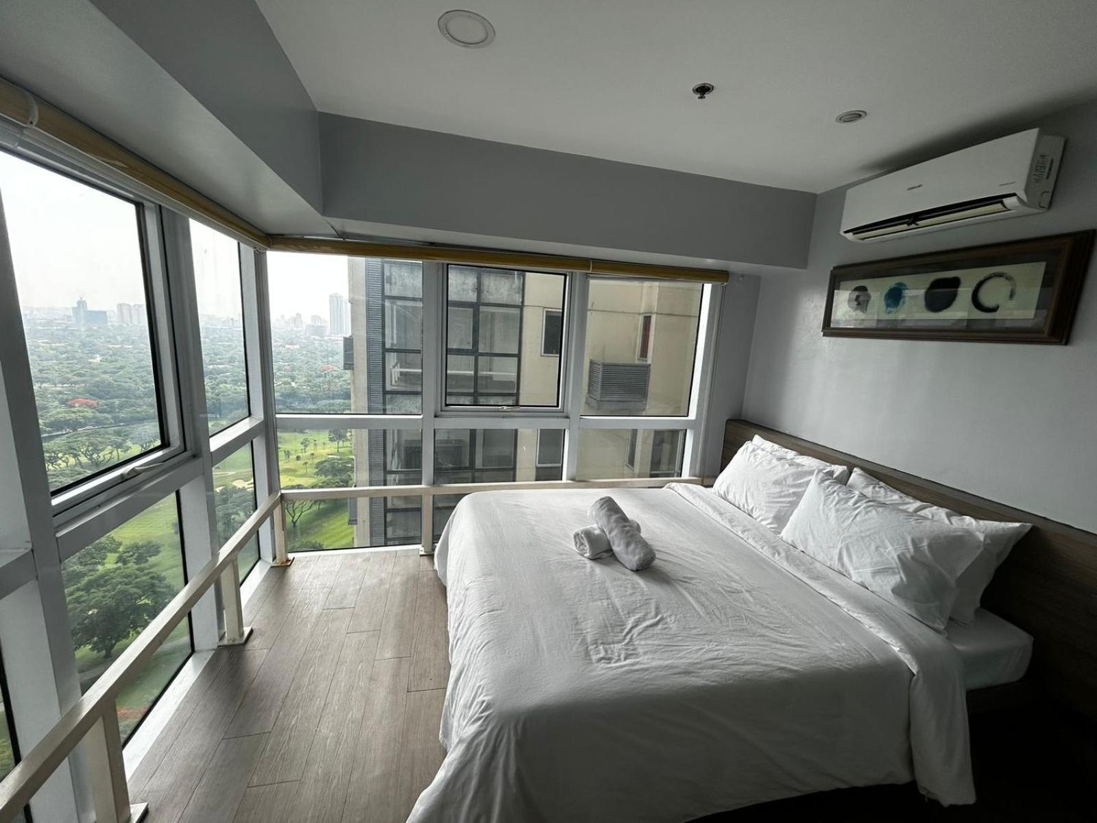 טאגיג Oasis Regency @ Fort Victoria Bgc מראה חיצוני תמונה