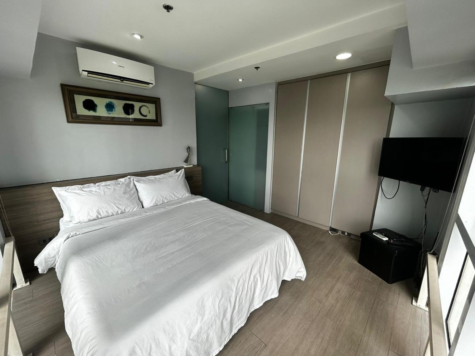 טאגיג Oasis Regency @ Fort Victoria Bgc מראה חיצוני תמונה