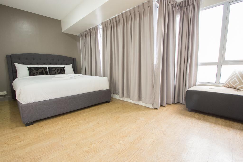 טאגיג Oasis Regency @ Fort Victoria Bgc מראה חיצוני תמונה