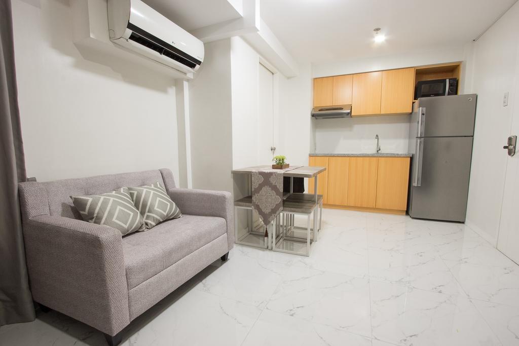 טאגיג Oasis Regency @ Fort Victoria Bgc מראה חיצוני תמונה