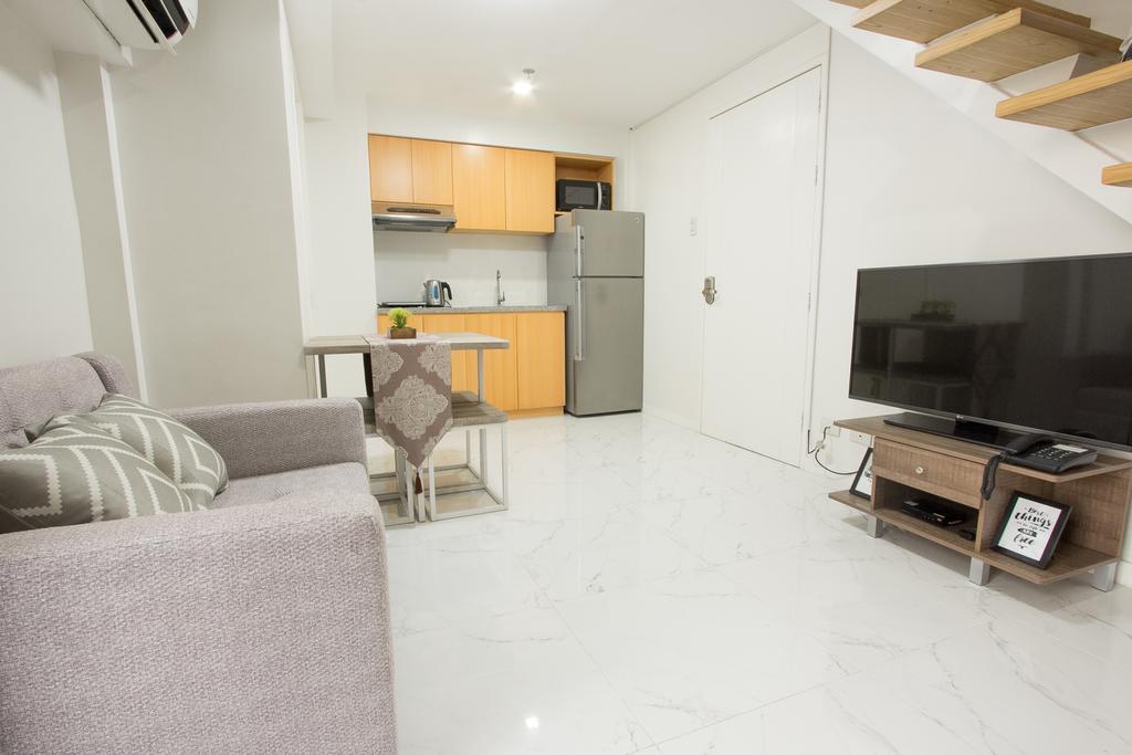 טאגיג Oasis Regency @ Fort Victoria Bgc מראה חיצוני תמונה