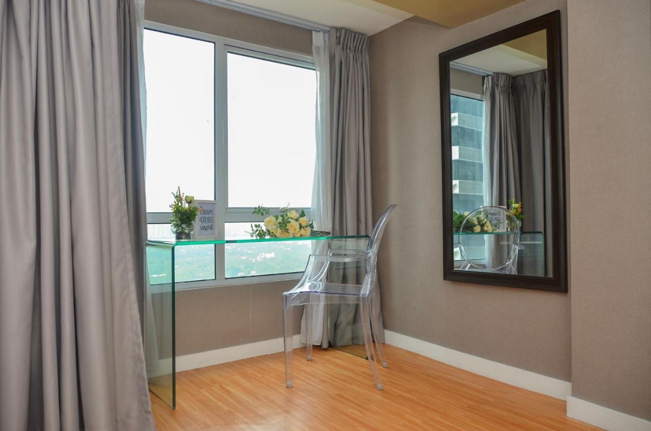 טאגיג Oasis Regency @ Fort Victoria Bgc מראה חיצוני תמונה