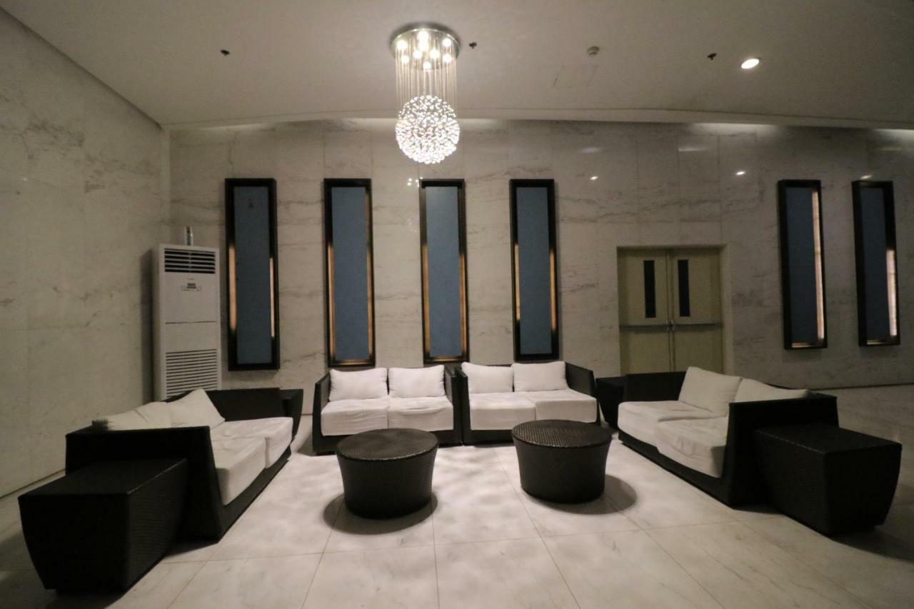 טאגיג Oasis Regency @ Fort Victoria Bgc מראה חיצוני תמונה